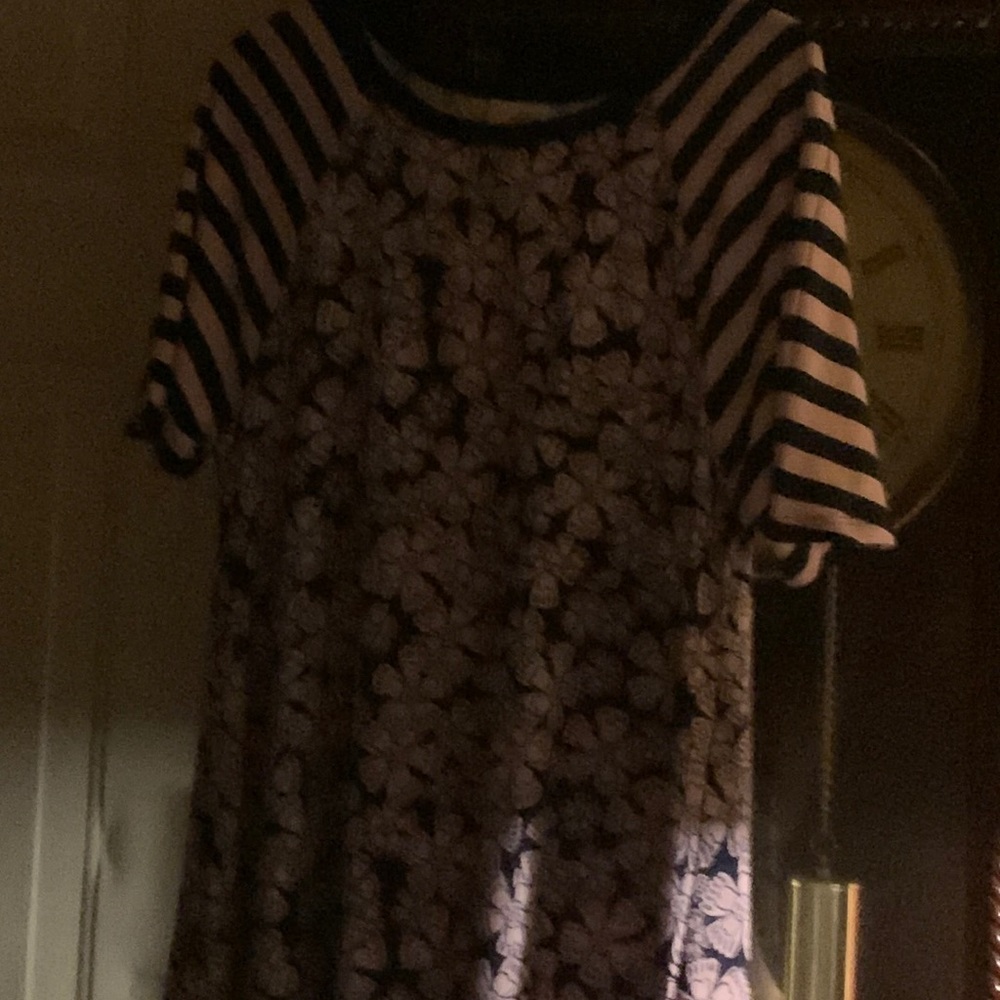 Used in real good condition lula roe size small pink and black flowers